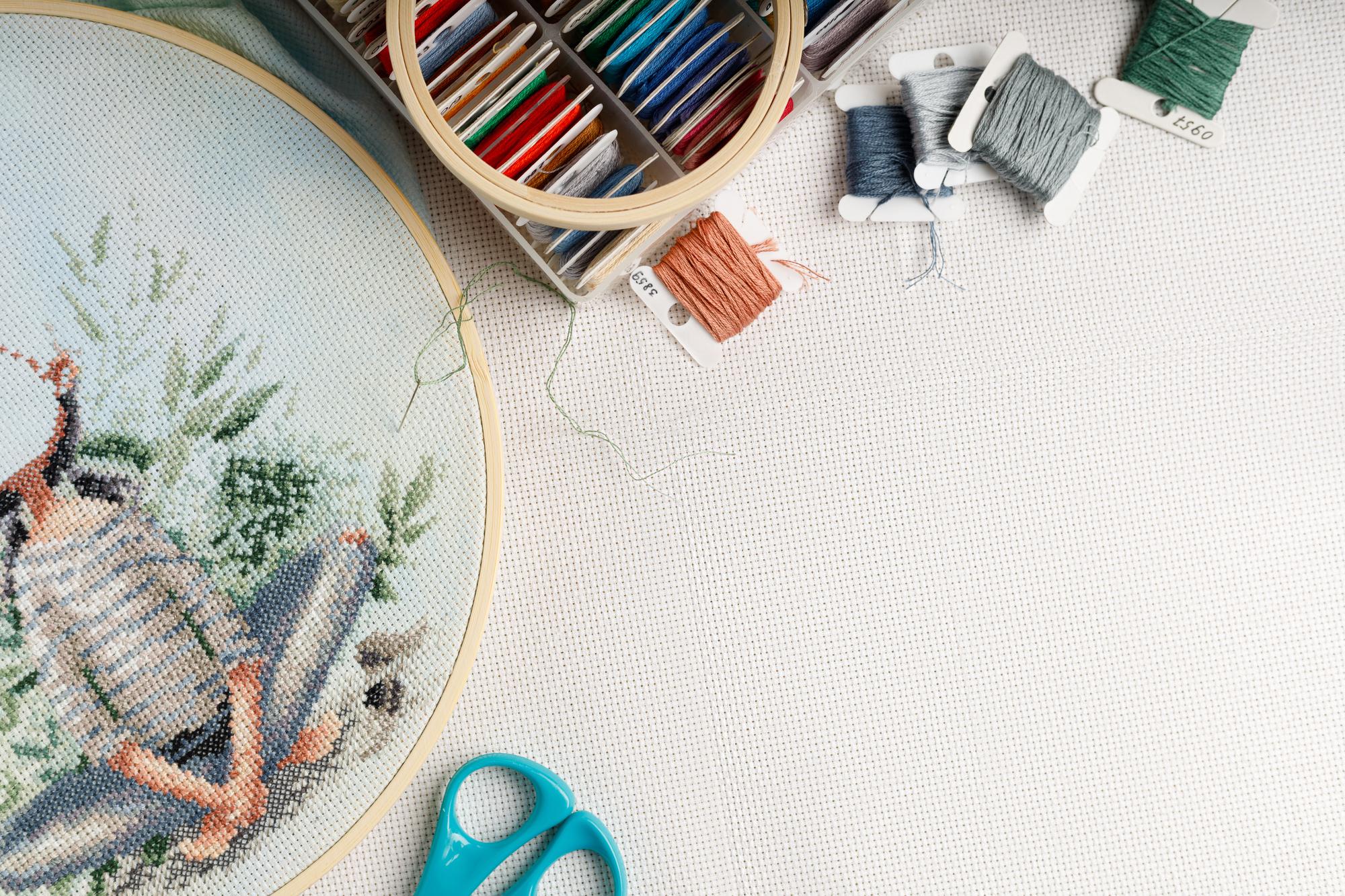 Workshop table with embroidery tools